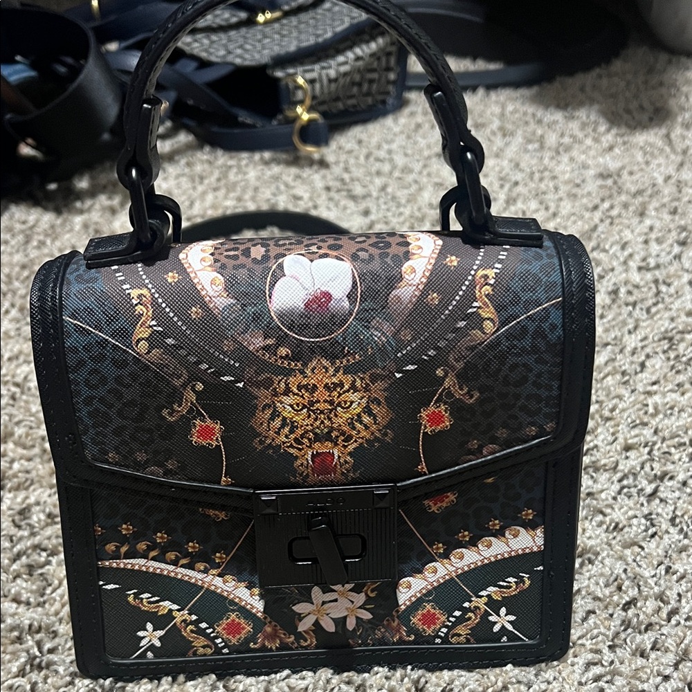 Aldo Black and Gold Mini Bag with Intricate Design